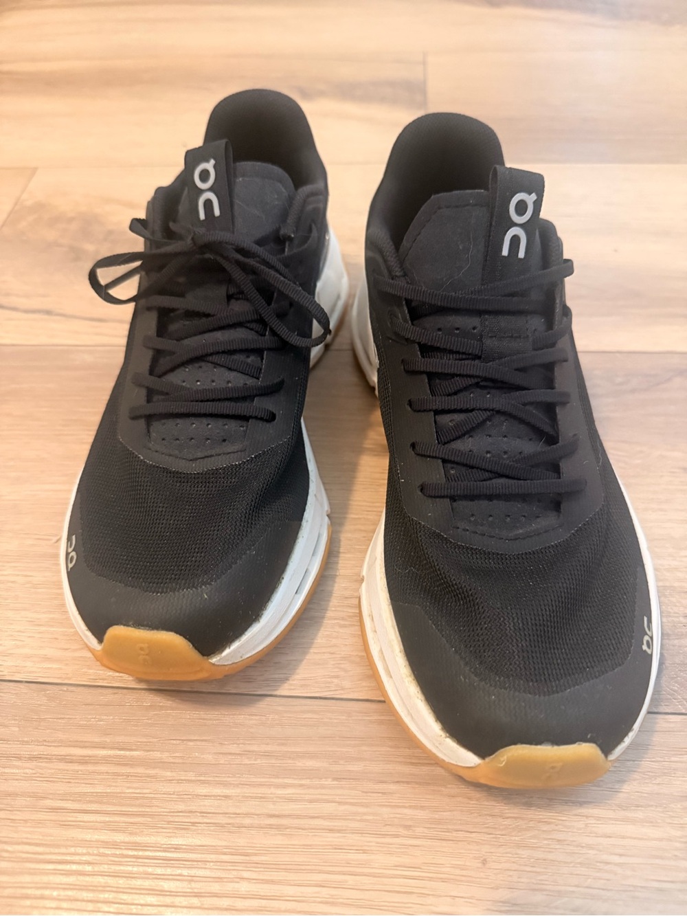 On Running Women’s Black and Tan Low-Top Sneakers